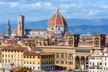 Fototapeta na wymiar Florence cathedral (Duomo) over city center, Italy (inscription 
