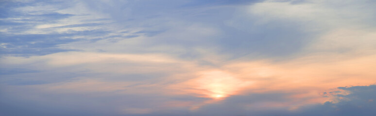 Naklejka na ściany i meble Bright clouds in the evening sky