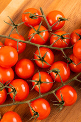 Red Tomatoes on chopping board