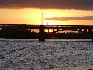 Fototapeta na wymiar Sunset, with Ponte Maua in the background. Jaguarao, RS, Brazil.