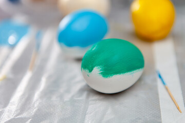 Easter eggs natural coloring on wooden background. Colorful Easter eggs collection
