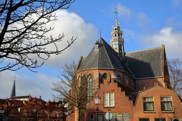 Fototapeta premium The external facade of Oosterkerk church (dated from 1519) located along Grote Oost street in Hoorn, West Friesland, Netherlands