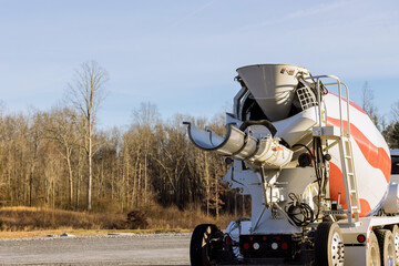 In construction site special concrete transport mixing truck is delivered ready to outpour concrete...