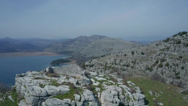 Ancient Illyrian Fortress Oblun on the Hill Above Little Mud Lake, Montenegro. Remains of Illyrian Megalithic Walls and Remains of Old Orthodox Church. Oblun i Malo Blato