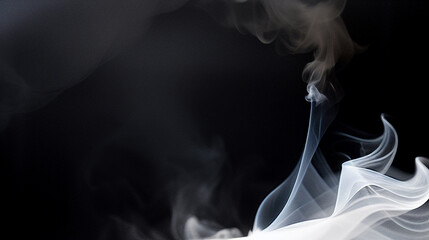 暗い背景に湧き上がって流れるスモーク　煙　霧Smoke rising and flowing on a dark background