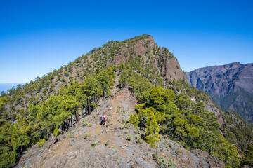 Young woman summit to Bejenado Peak in Caldera de Taburiente, La Palma, Spain