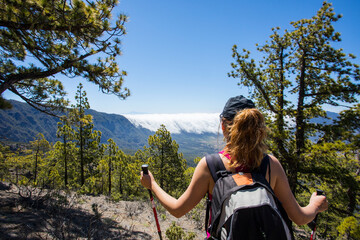 Young woman summit to Bejenado Peak in Caldera de Taburiente, La Palma, Spain