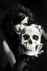 Fashionable kawaii witch with skull