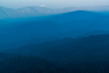 Complex mountain ridges of northern Thailand seen from the second highest mountain in Thailand, Doi Pha Hom Pok, Fang, Chiang Mai, Thailand.