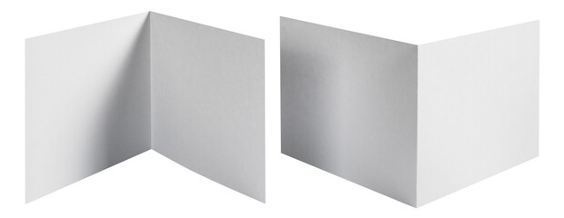 Folded sheets of white paper cut out