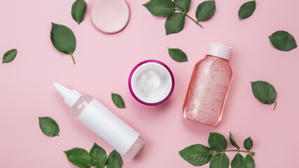 Flat composition with cosmetics on a colored background