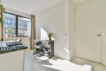 Modern workplace with computers and potted plants