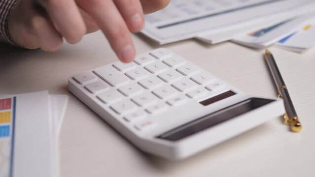 close a calculator on the table 4k slow moton