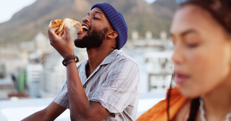 Naklejka premium Couple, eating pizza and bonding on city building rooftop in Miami, Florida while dancing, enjoying and relaxing. Smile, happy black man and woman with fast food in relax tourist location for summer