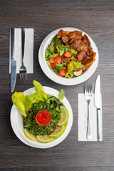 Fattouch and tabouleh Lebanese salad isolated on white, traditional lebanese salad of tabbouleh and fattouch