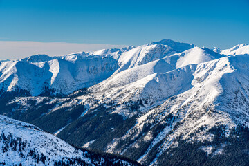 Poland 2022. Beautiful view on the snow Tatry. Zakopane, Giewont, Kasprowy Wierch, Swinica, Rysy, Kresanica.