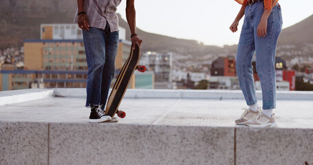 Skateboard, friends and city with a man and woman skating on a rooftop outdoor during the day....