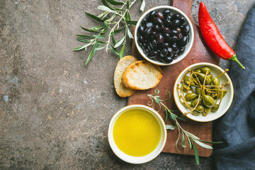 Naklejka na ściany i meble A set of olives and olive oil