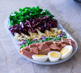 Keto Healthy Tuna Salad. Lunch on Marble Background. Selective Focus.