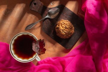 Breakfast on the table. Food and napkin on a dark background. Abstract backdrop