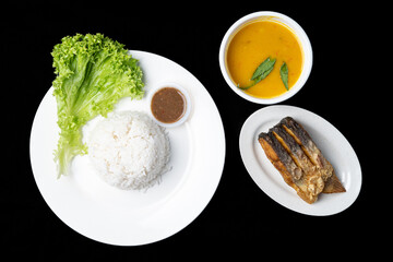 Patin goreng is a Traditional Indonesian Food, served with rice.