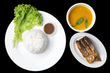 Patin goreng is a Traditional Indonesian Food, served with rice.