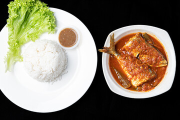 Asam Pedas Ikan translated as Spicy Sour Fish. Polular in Malaysia especially Malacca. Served on rice.