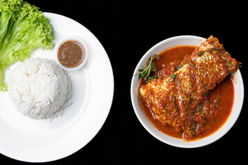 Asam Pedas Ikan translated as Spicy Sour Fish. Polular in Malaysia especially Malacca. Served on rice.
