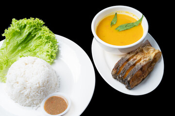 closeup Patin goreng is a Traditional Indonesian Food, served with rice.