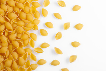 Pasta products in the form of a shell, texture, on a white background