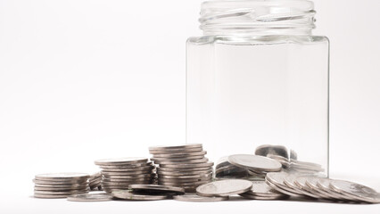 glass jar with coins