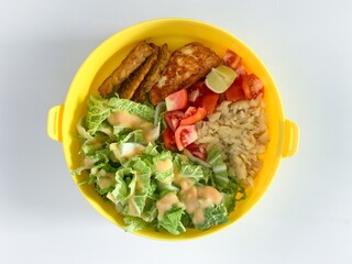 bowl of vegetable salad isolated on white background.