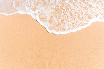 Tropical beach background with soft wave and white sand