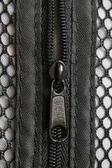Closeup of zipper on textile handbag