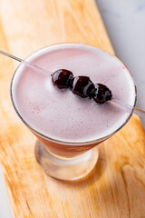 Cosmopolitan cocktail. Cosmo cocktail, is a cocktail made with vodka, Cointreau, cranberry juice, and freshly squeezed or sweetened lime juice. Classic drink made famous on popular TV shows. 