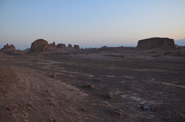 dry desert landscape of "Kalouts desert", Iran in evening light