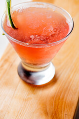 Cosmopolitan cocktail. Cosmo cocktail, is a cocktail made with vodka, Cointreau, cranberry juice, and freshly squeezed or sweetened lime juice. Classic drink made famous on popular TV shows. 