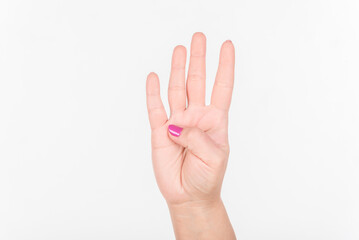 Obraz premium Woman Hand With Polish Nails Show Four Fingers. White Background.