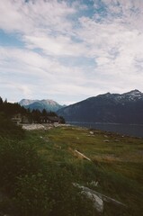 house on the lake in the mountains