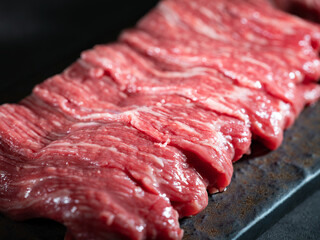 Fresh raw meat on stone plate