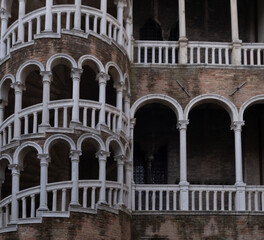 Fototapeta na wymiar Graceful Staircases & Arches Of The Scala Contarini Tower