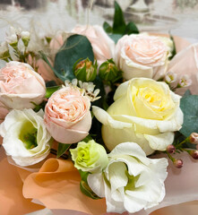 a beautiful bouquet of pink, white and yellow roses