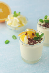 Orange lemon citrus milk mousse in glasses