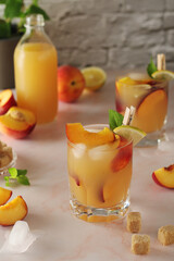 Glasses with peach juice cocktail