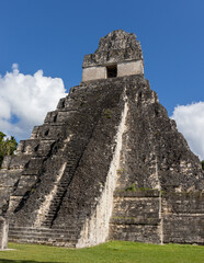 Fototapeta na wymiar Mayan Temple Guatemala. Temple 1 or great jaguar temple in Tikal National Park on UNESCO World Heritage Site. The Grand Plaza