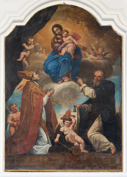 POLIGNANO A MARE, ITALY - MARCH 4, 2022: The paintin of Madonna of Scapular with St. Simon Stock and St. Januarius Cathedral Matrice.