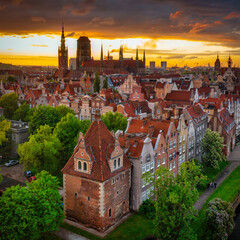 Amazing architecture of the main city in Gdansk at sunset, Poland. Aerial view of Granaries Island...