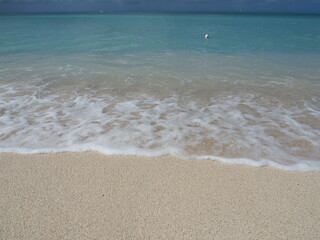 Fototapeta na wymiar Caribbean ocean and sand. ocean with white sand. water over sand