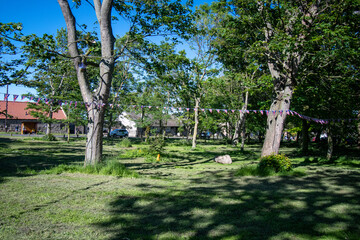 Union Jack flag bunting in Bamburgh village green during Platinum Jubilee celebration in June 2022