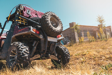 Exploring the terrain: a 4x4 buggy overcoming obstacles in its path © Komuso & Colorsandia